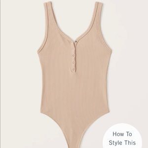Seamless ribbed henley bodysuit